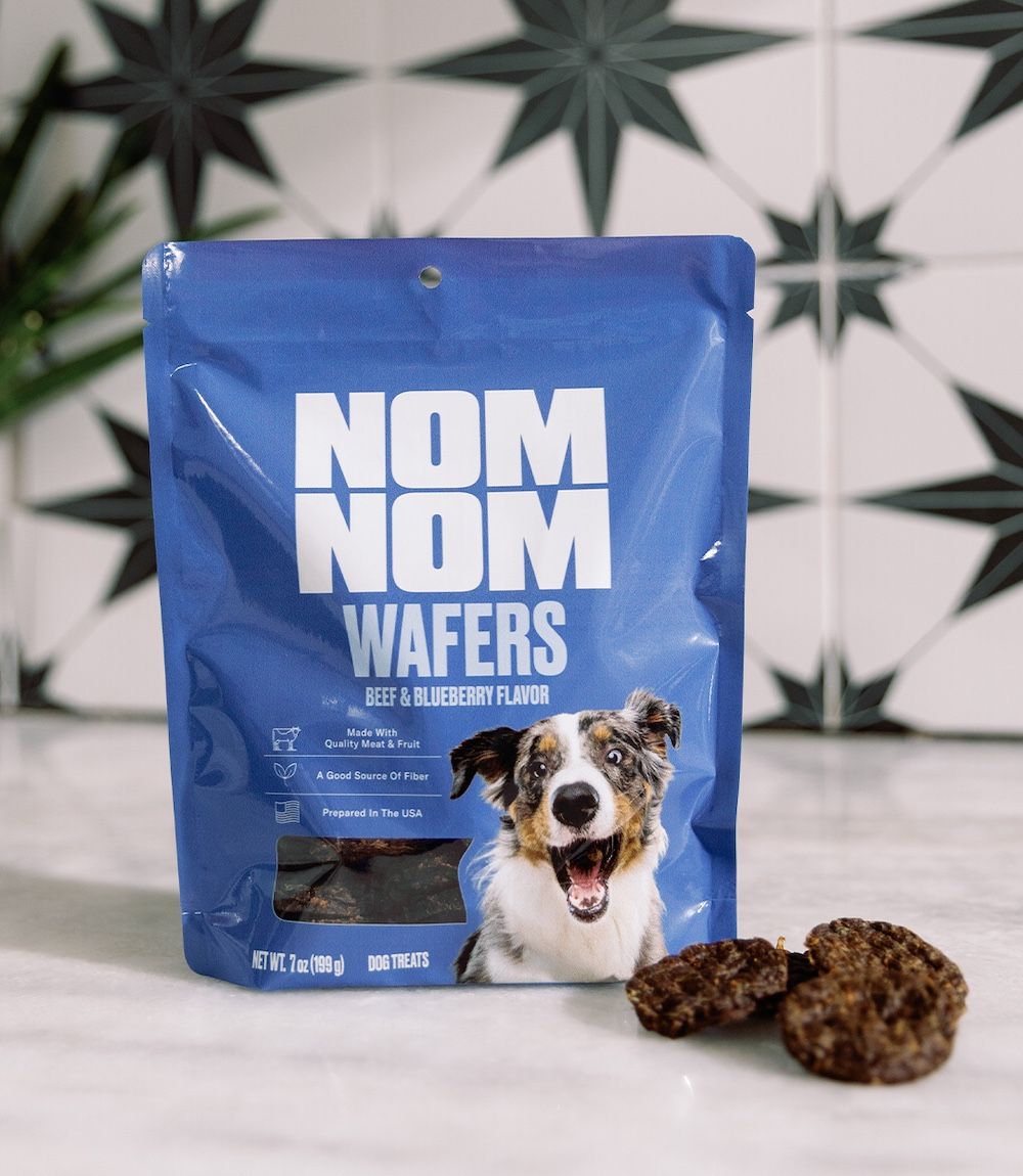 Some Beef & Blueberry Flavor Wafers spread out in front of their packaging