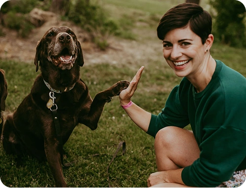 Tori Mistick high fives her dog